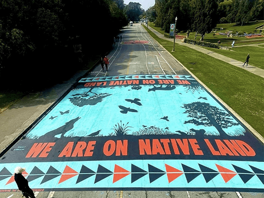 This mural, “We Are on Native Land: Honoring the Original Stewards,” marks the entrance to Golden Gate Park at Stanyan. 