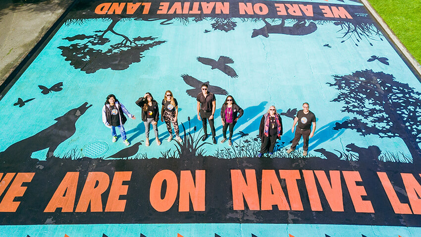 Portrait of We Are On Native Land Mural